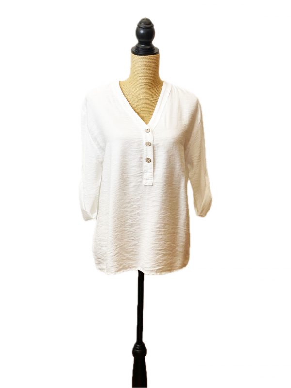 Blusa blanca de cuello pico
